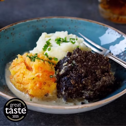 Haggis, neeps and tatties on a plate